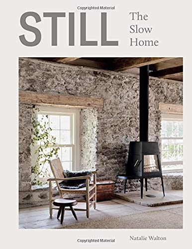 Book cover titled Still: The Slow Home featuring a rustic room with stone walls.