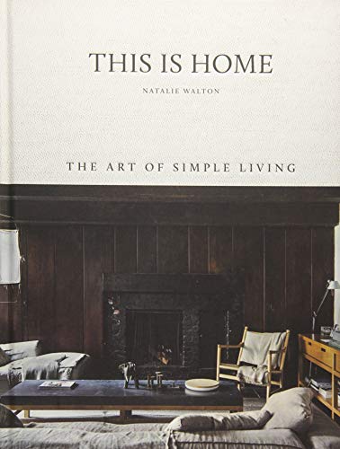 Book cover showing a living room with a dark fireplace, wooden walls, and furniture.