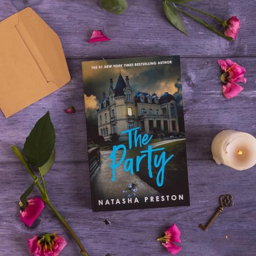 Book cover with a mansion, scattered petals, and a small key.
