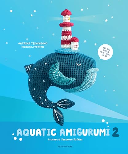 A blue crocheted whale with a small lighthouse on its head against blue background.