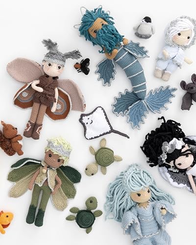 Crocheted amigurumi dolls depicting various animals and mythical creatures.