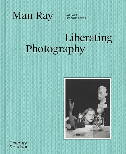 Book cover for “Man Ray: Portraits” with a black and white photograph.