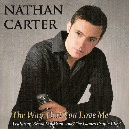 CD cover featuring Nathan Carter, singer with a microphone.