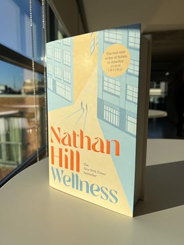 Book cover for "Wellness" by Nathan Hill, with building illustration.