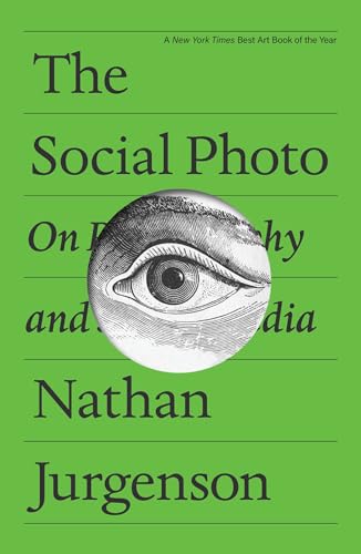 Green book cover with black text and a grayscale eye illustration centered.