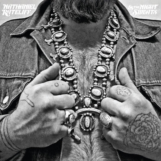 Black and white album cover featuring a man with tattoos and jewelry.