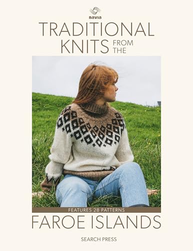 A woman with red hair wears a patterned knit sweater in a grassy field.