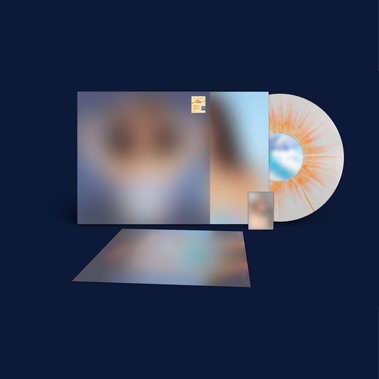 Nayeon vinyl record with blurred cover art and orange disc.