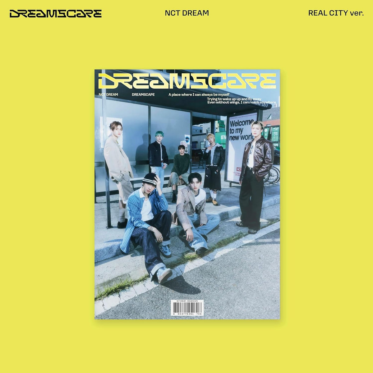 NCT DREAM album cover: green compass design with text and abstract shapes.