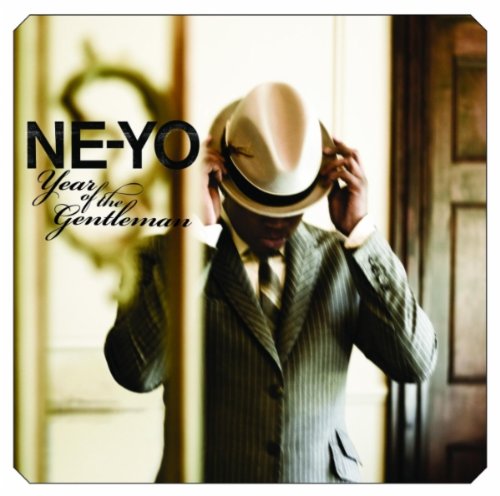 Ne-Yo album cover, "Year of the Gentleman," featuring a man in a suit and hat.