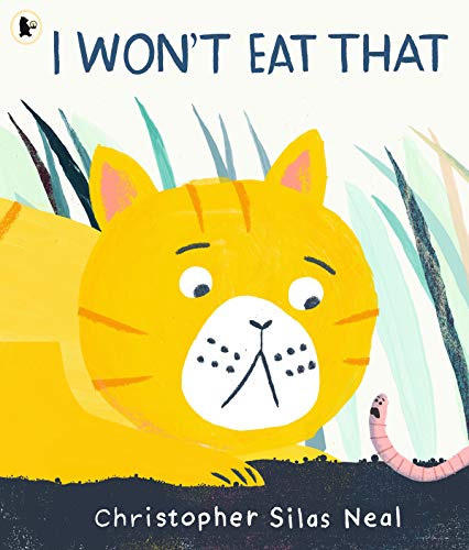 Yellow tiger looks displeased at a worm in green grass.