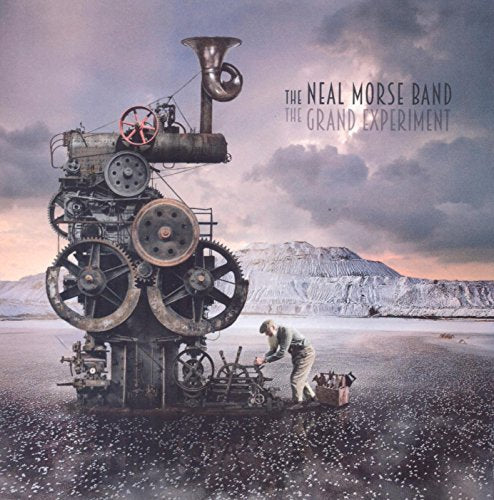 Album cover: complex steampunk machine with a figure in a landscape.