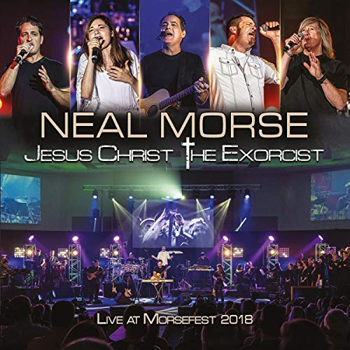 Neal Morse album cover featuring musicians performing on stage with lighting.