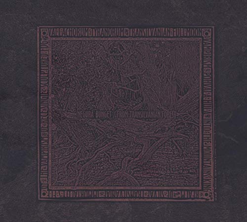 Dark album cover with intricate, textured forest imagery and band name.