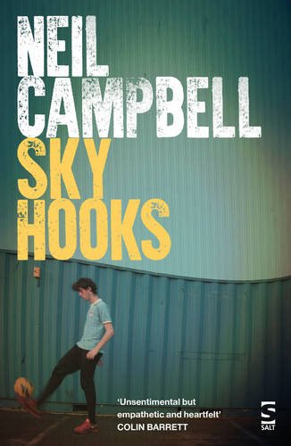 Book cover: boy kicking a soccer ball in front of blue containers.