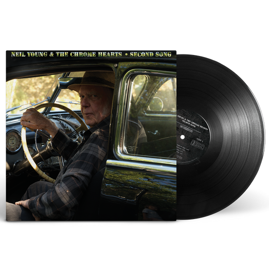 Vinyl record with cover art featuring Neil Young driving a car.