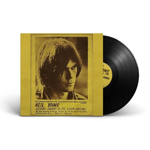 Neil Young vinyl record with yellow cover featuring a portrait of the artist.