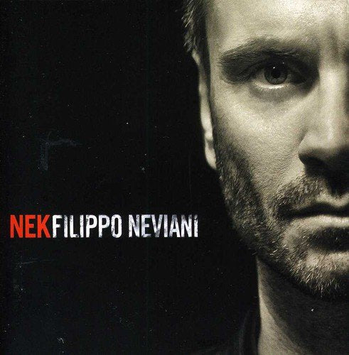 Close-up portrait of Nek, Filippo Neviani, on CD cover in grayscale.