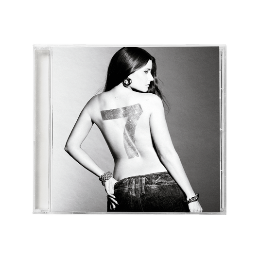 Black and white CD cover featuring Nelly Furtado with a number seven on her back.