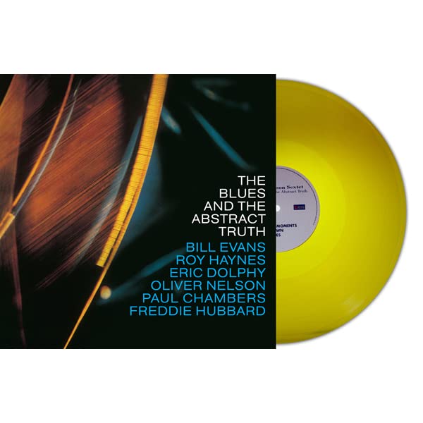Yellow vinyl record with album title "The Blues And The Abstract Truth".