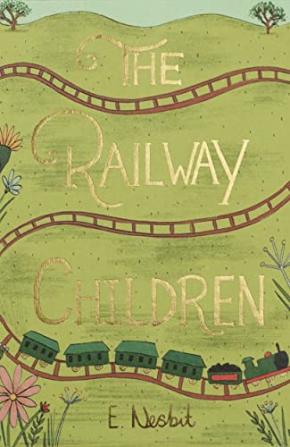 Book cover for The Railway Children featuring a train on tracks over green hills.
