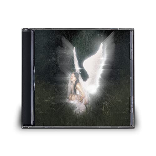 CD case featuring a woman with angel wings in a dark field.