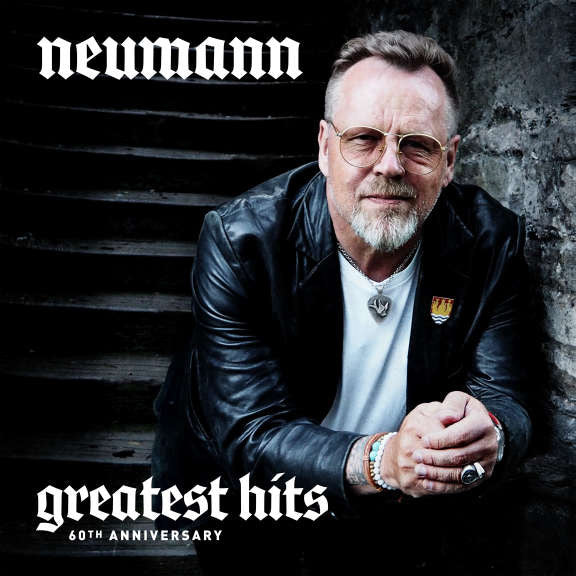 Album cover for Neumann’s “Greatest Hits 60th Anniversary” featuring a portrait.