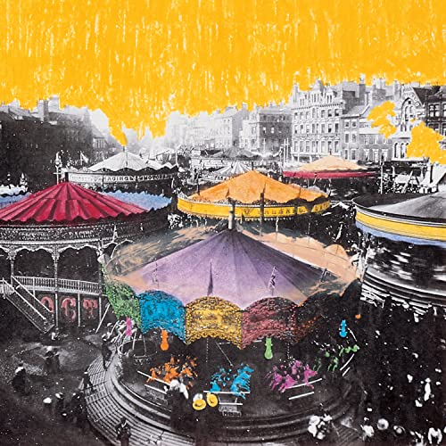 Black and white photo of carousels with a bright yellow painted sky overlay.