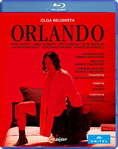 Blu-ray cover for "Orlando" featuring a seated person in red lighting.