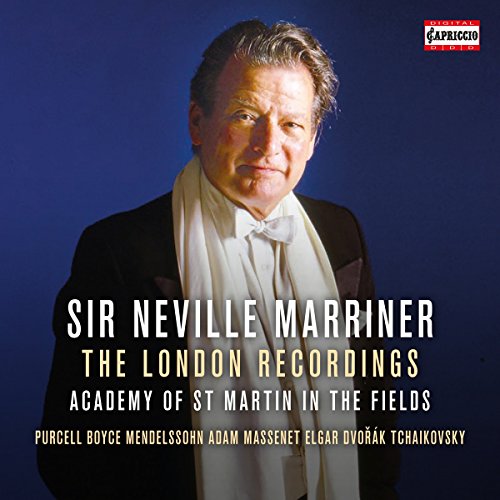 Portrait of Sir Neville Marriner in a tuxedo against a dark blue background.