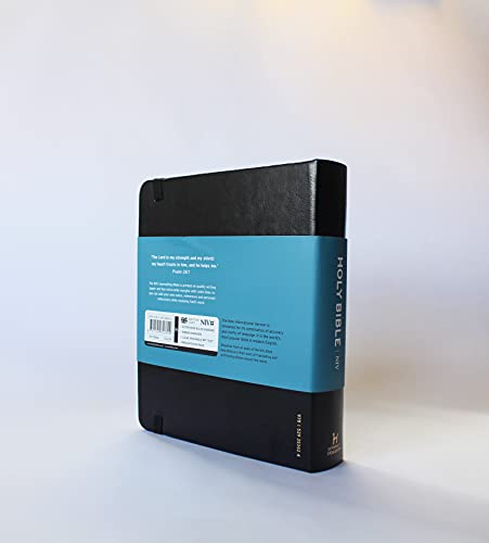 Black hardback Bible with blue accent and barcode on spine.