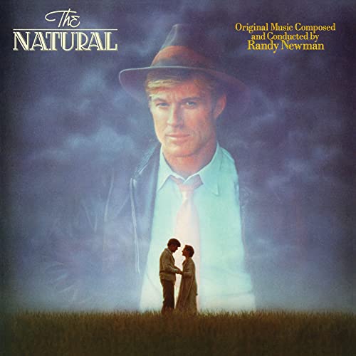 Album cover for “The Natural” featuring Robert Redford in a hat.