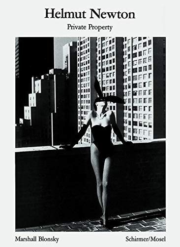 Black and white photo of a woman in a swimsuit and bunny ears.