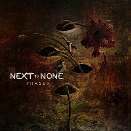 "CD cover art with a dark face and wilting flowers, titled 'Next To None - Phases'."