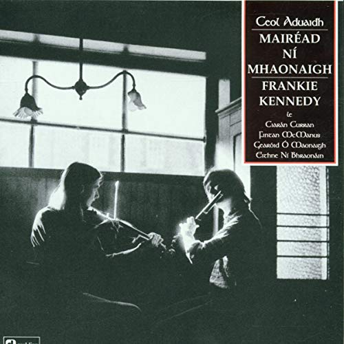 CD cover featuring two musicians with flutes, black and white photo.