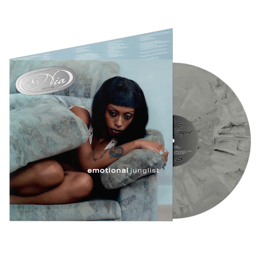 Vinyl record with a portrait of Nia Archives and marbled grey coloring.