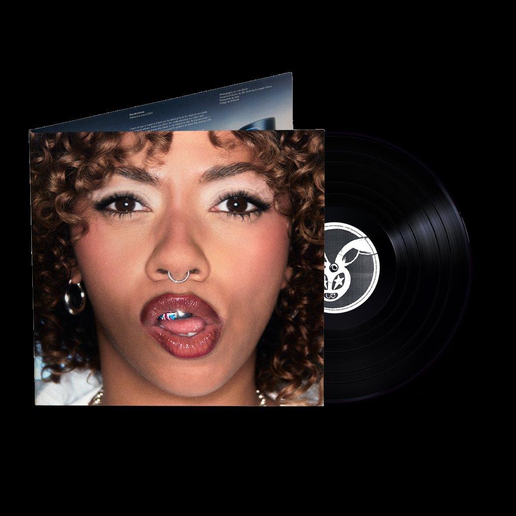 Vinyl record with album cover featuring a close-up portrait of Nia Archives.