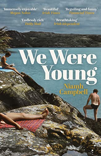 Book cover: "We Were Young" with people by the sea and rocks.