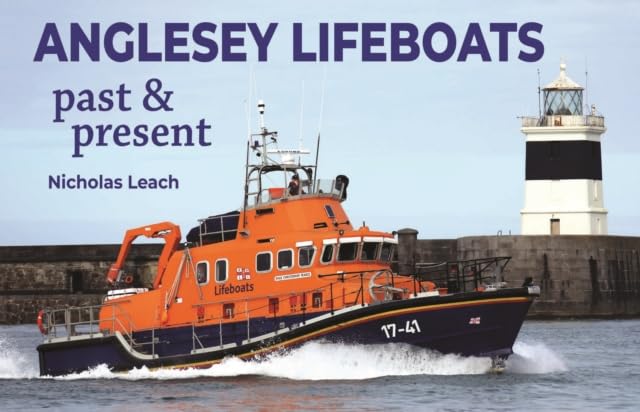 Orange lifeboat at sea with a lighthouse in the background.
