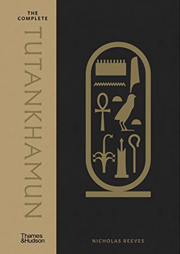 Book cover for “The Complete Tutankhamun” with Egyptian symbols.