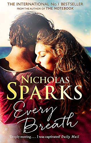 A man and woman embrace against a sunset beach background on a book cover.