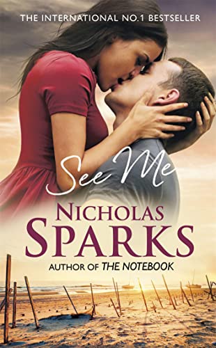 Book cover: couple embracing, beach scene, title "See Me" by Nicholas Sparks.