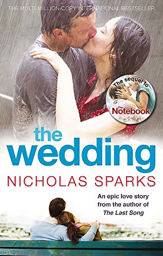 Book cover: couple kissing in the rain, title "The Wedding" by Nicholas Sparks.