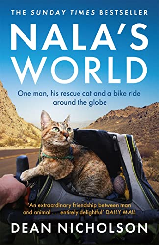 Book cover: cat in a bike basket with mountainous background.