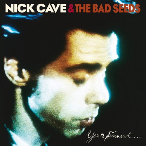 Album cover featuring a close-up of a man's face against a black background.