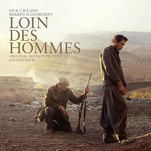 Soundtrack album cover featuring two men with rifles in a desert landscape.