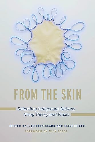 Book cover: “From the Skin” with abstract art of skin and blue thread.