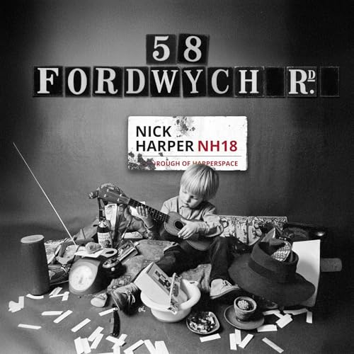 Black and white album cover featuring a child with a ukulele.