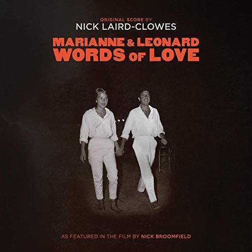 "Black vinyl record with orange label, sleeve, and booklet on a white background."