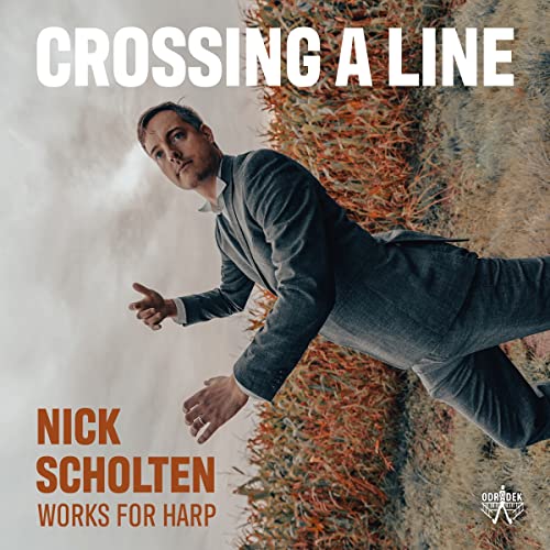 Album cover: man in suit appears to fall against a textured wall.